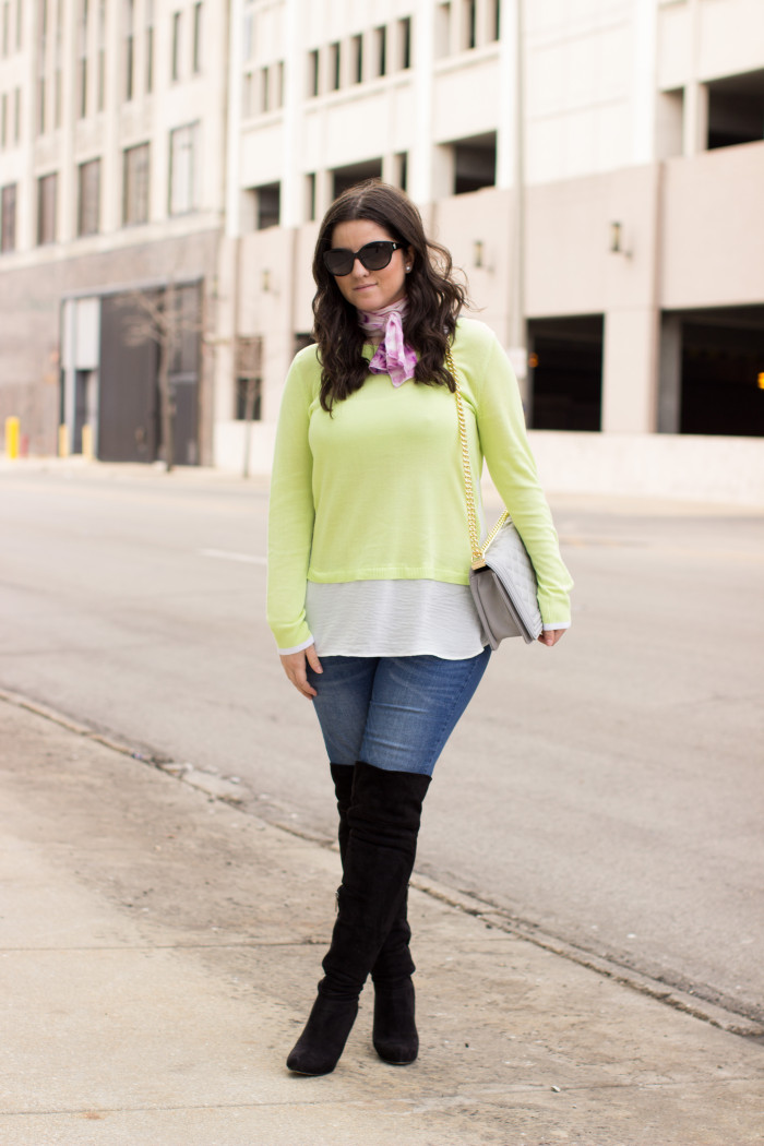 neon sweater, neon womens top, green top, spring outfit idea, medium wash jeans, gray crossbody, chain crossbody