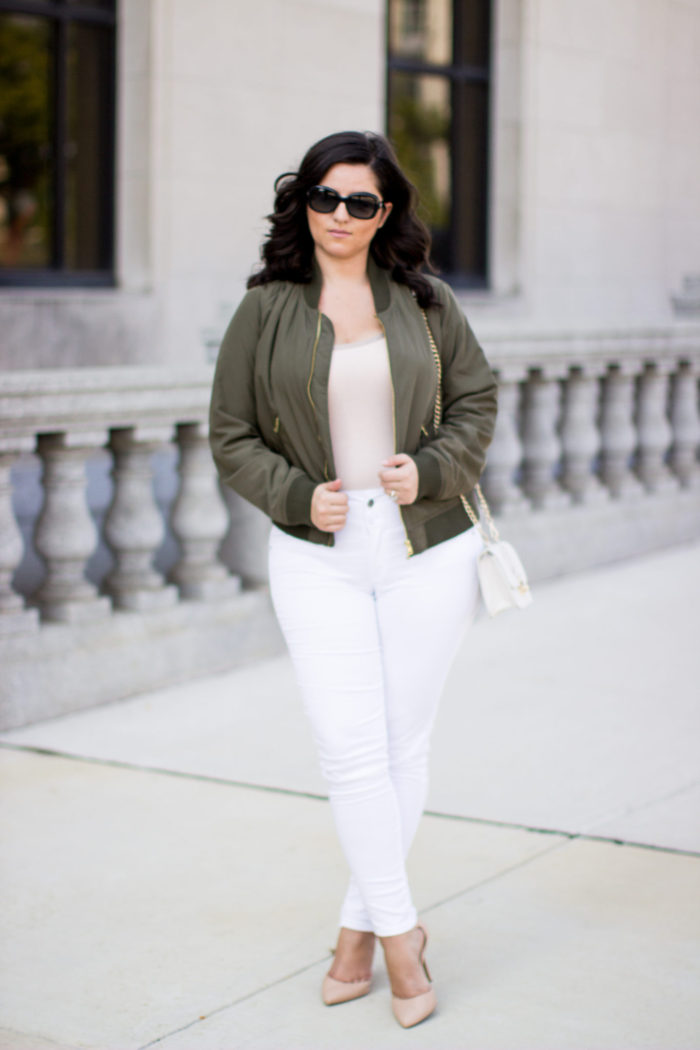 kim kardashian bomber jacket outfit, green bomber jacket, white jeans, beige pointed pumps, kim kardashian style, kim kardashian fashion, kim kardashian outfits