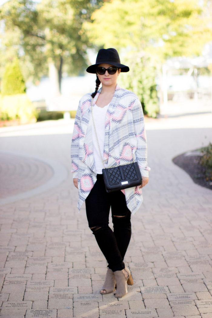 black jeans, printed cardigan, open toe suede booties, pop sugar hat, quilted crossbody, fall outfit idea. how to style black jeans