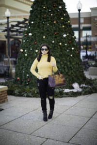 casual winter outfit with a yellow sweater