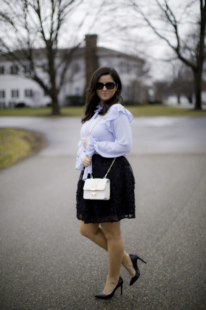 how to style a pussybow blouse, light blue blouse, black flower mini skirt, black pumps