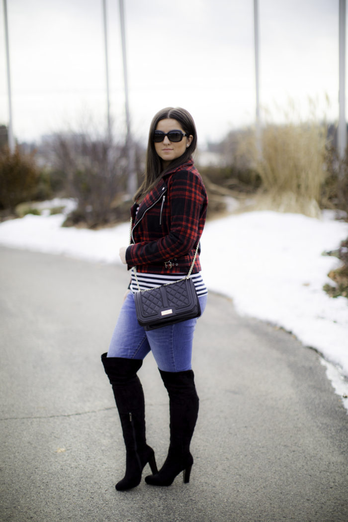 buffalo print jacket, striped top, quilted crossbody, black boots, winter outfit idea